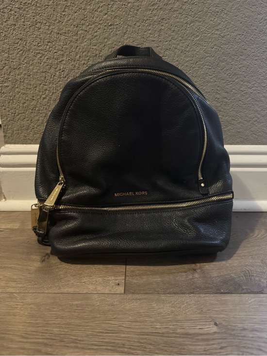 Michael Kors Handbags - Michael Kors Black Leather Backpack with Gold Hardware